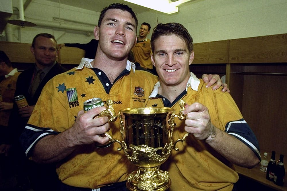 Daniel Herbert and Tim Horan celebrate winning the Rugby World Cup in 1999